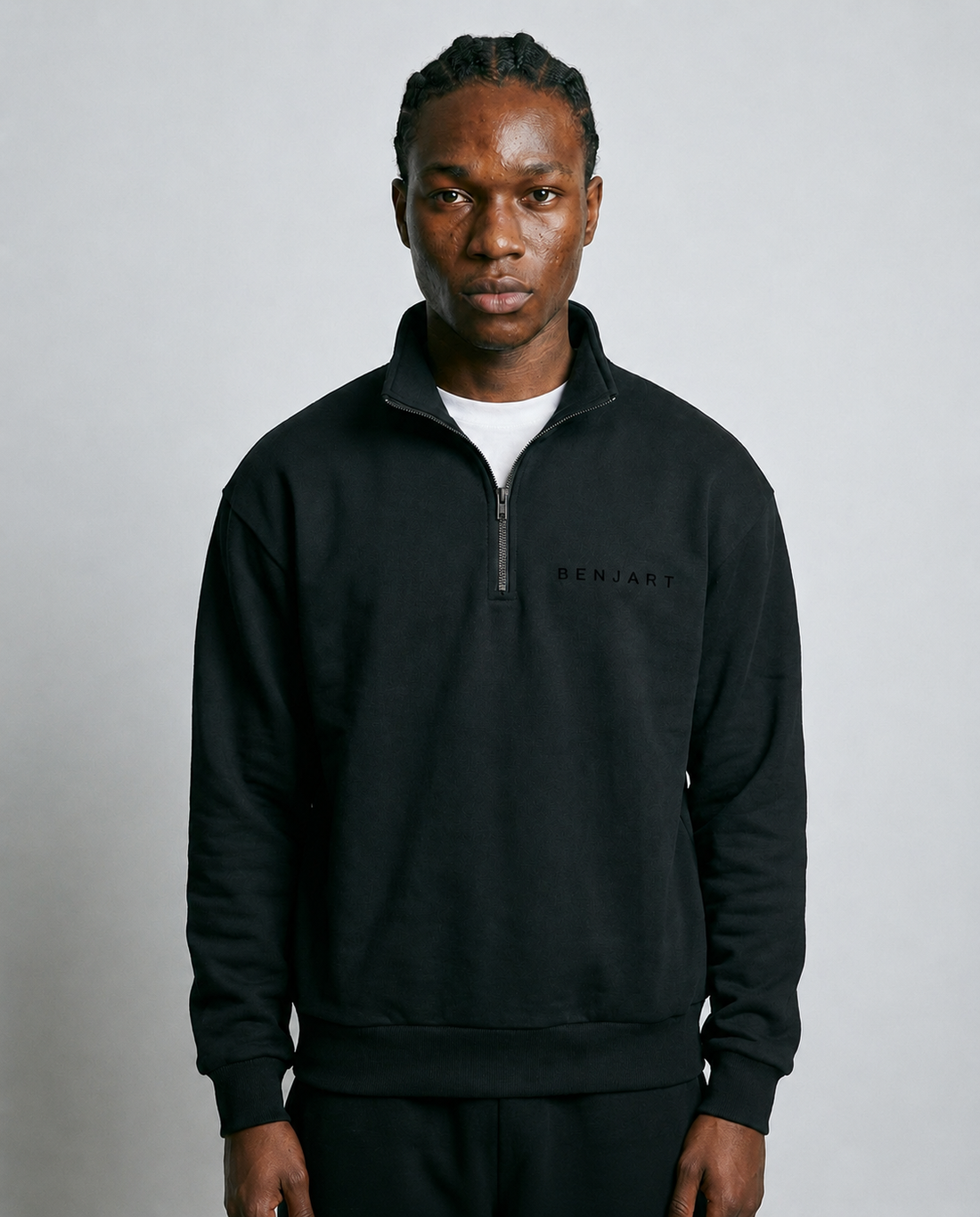 Benjart Blanks Quarter Zip Top in black, front view