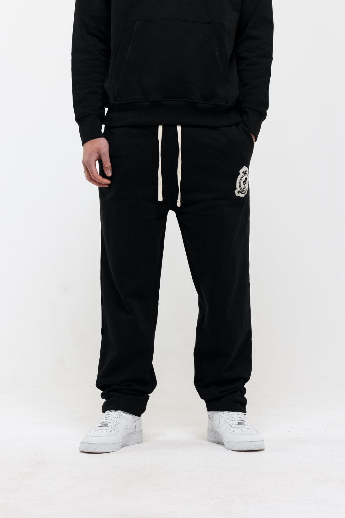 Benjart Chenille Badge Joggers in black, back view