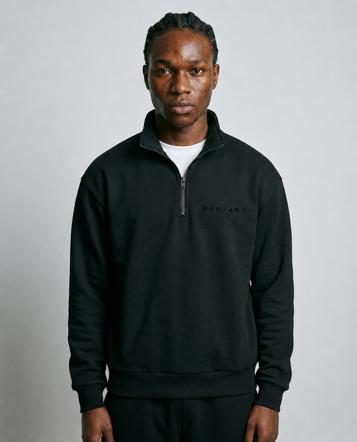 Benjart Blanks Quarter Zip Top in black, front view