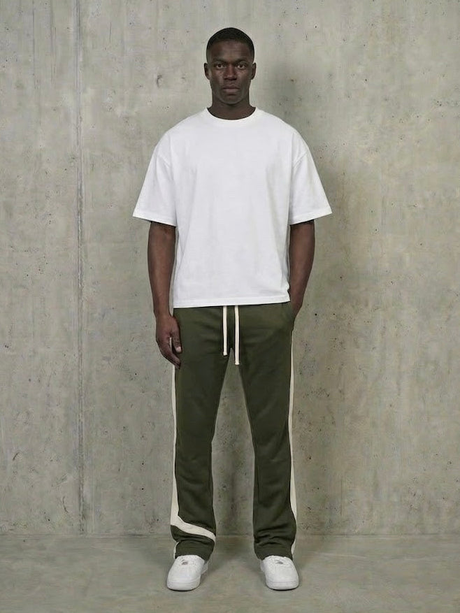 Benjart Marathon Track Pants in olive green, side view