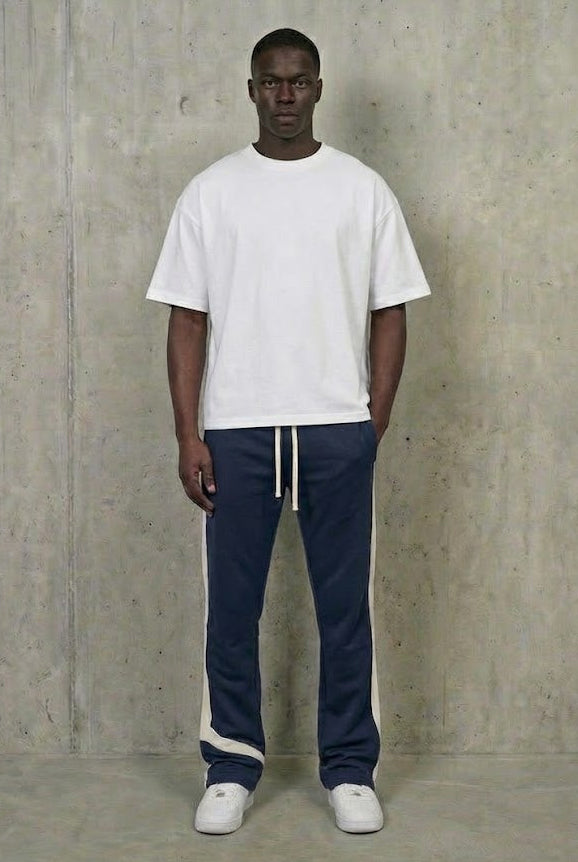 Benjart Marathon Track Pants in navy, side view